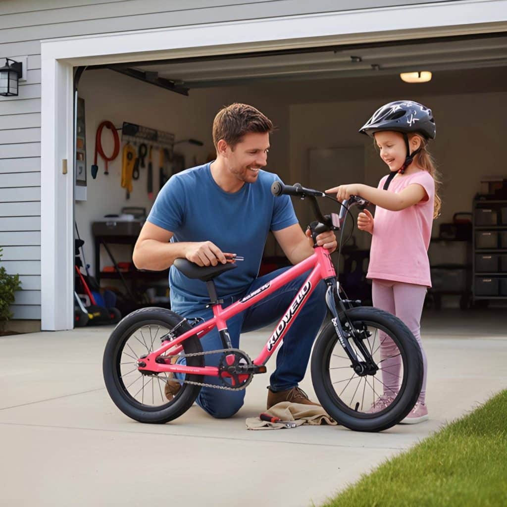 Adjusting a Kidvelo Rookie convertible bike seat height and handlebars in front of a garage